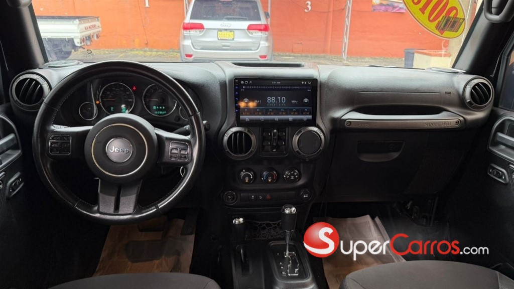 2015 Jeep Wrangler Unlimited Sport — foto 9 / 10
