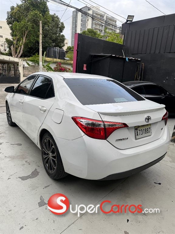 2014 Toyota Corolla LE — foto 5 / 12