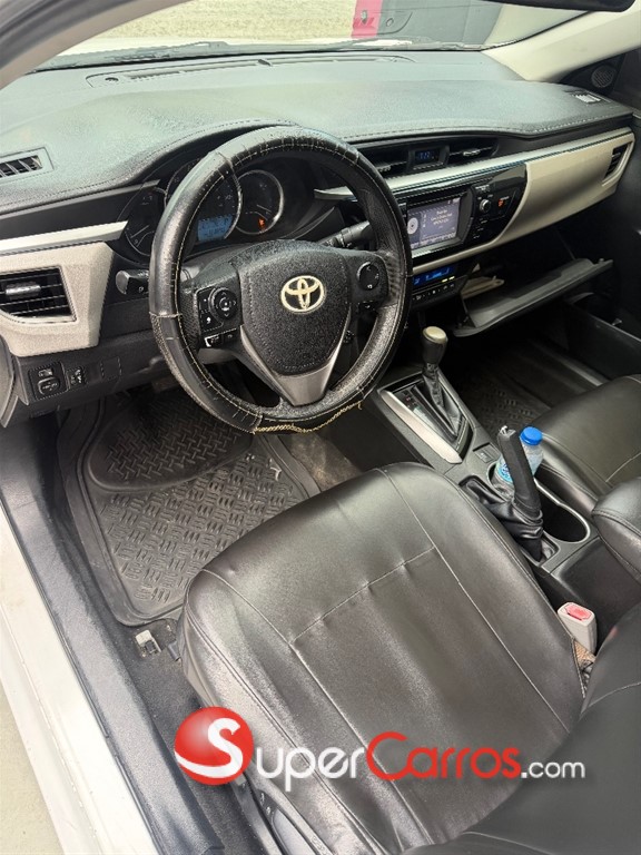 2014 Toyota Corolla LE — foto 7 / 12