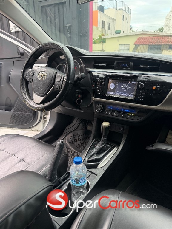 2014 Toyota Corolla LE — foto 9 / 12