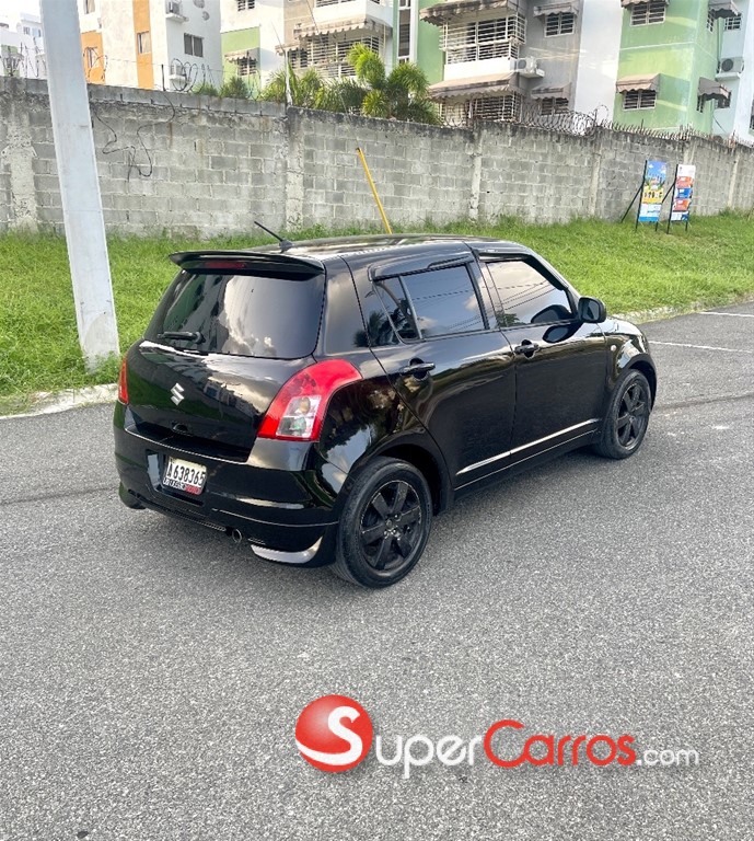 2009 Suzuki Swift — foto 4 / 11