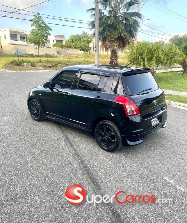 2009 Suzuki Swift — foto 5 / 11
