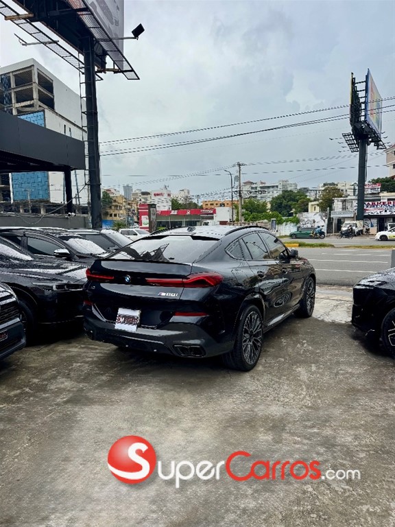 2024 BMW X 6 M60i — foto 7 / 12