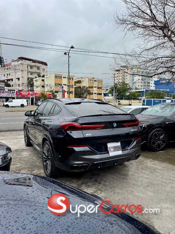 2024 BMW X 6 M60i — foto 8 / 12
