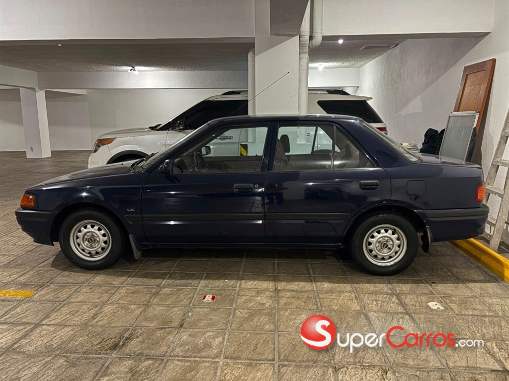 1992 Mazda 323 — foto 4 / 12