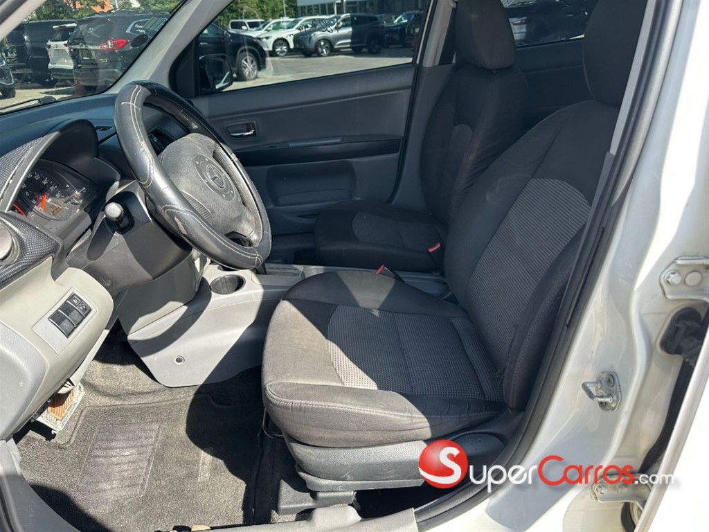 2006 Mazda Demio — foto 5 / 8