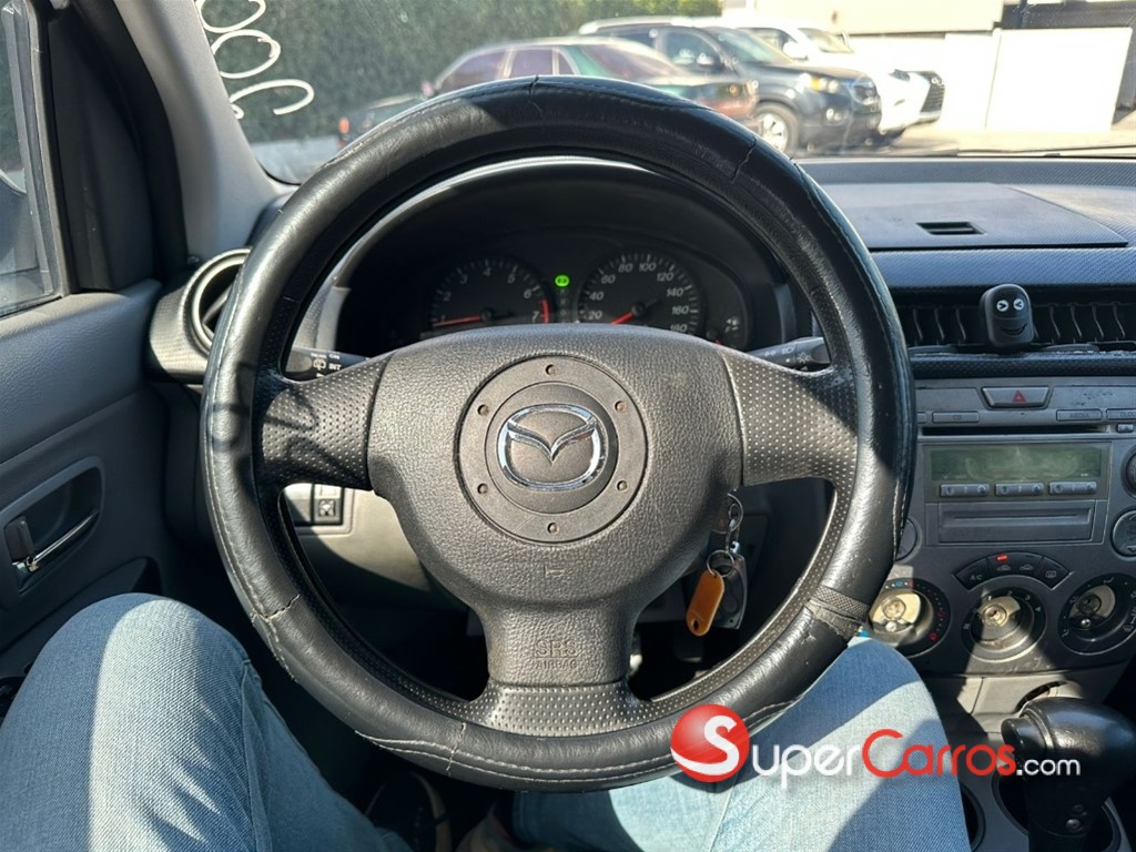 2006 Mazda Demio — foto 7 / 8