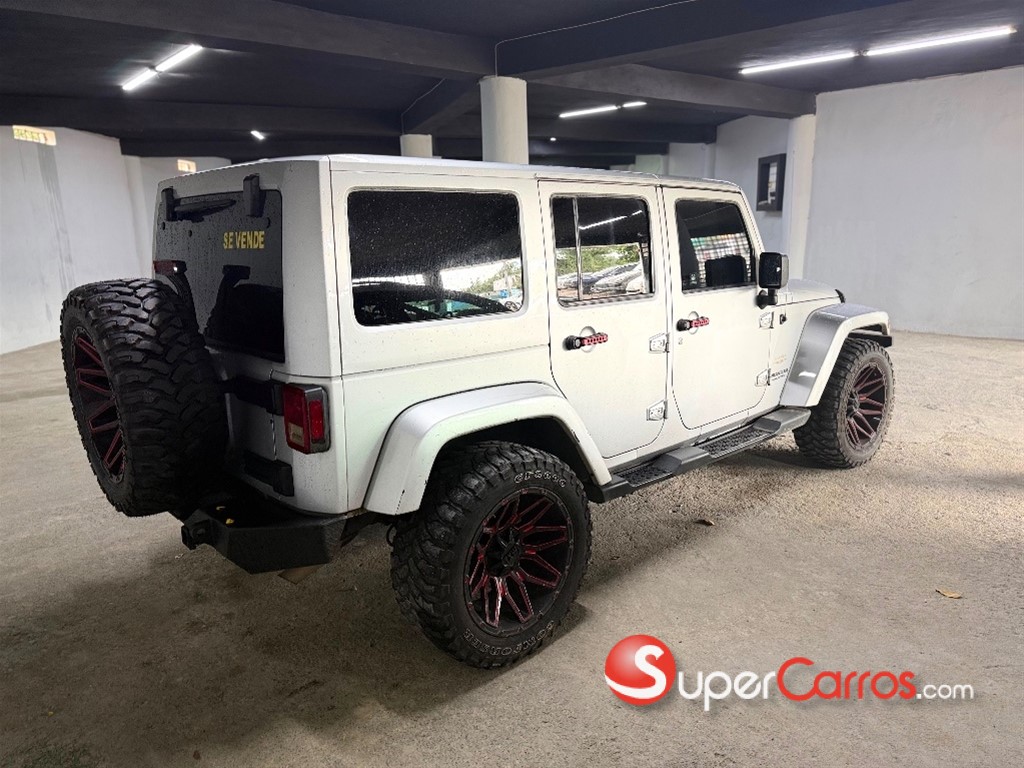 2011 Jeep Wrangler Unlimited Sahara — foto 9 / 10