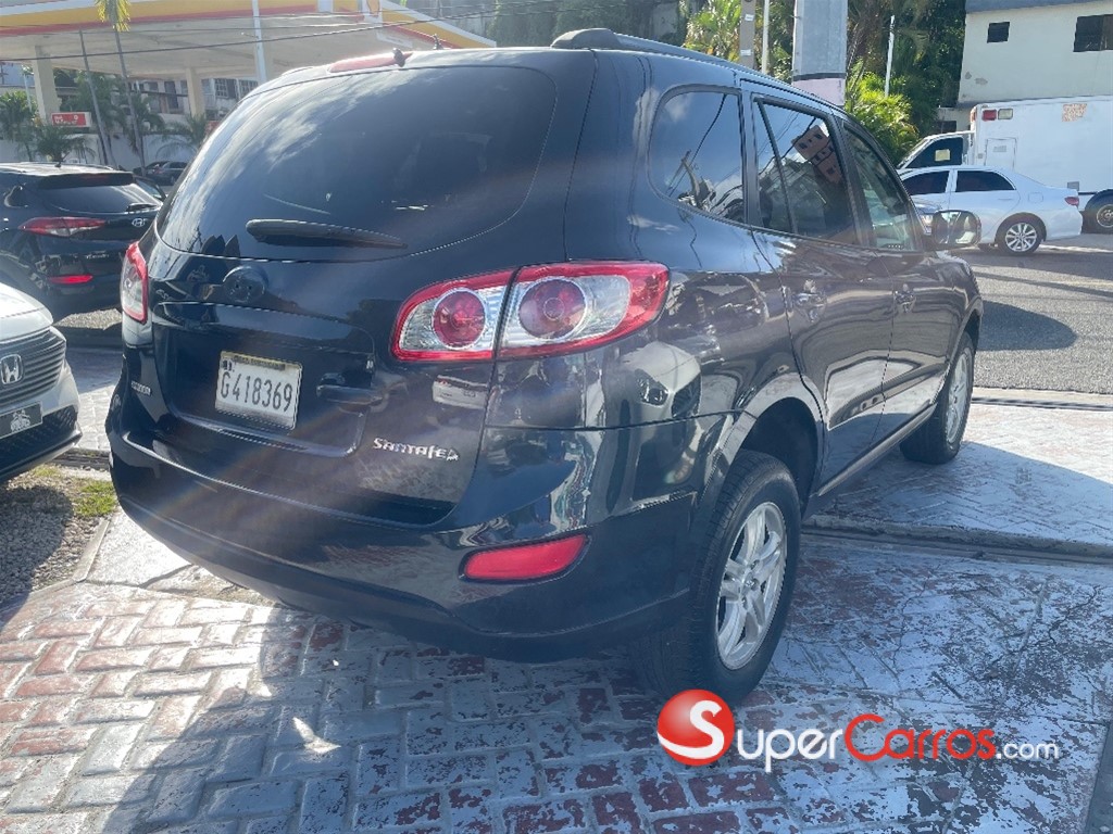 2011 Hyundai Grand Santa Fe — foto 4 / 9