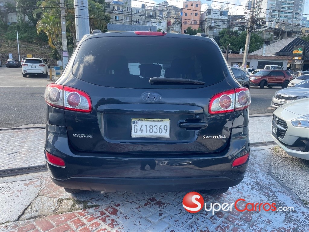 2011 Hyundai Grand Santa Fe — foto 5 / 9