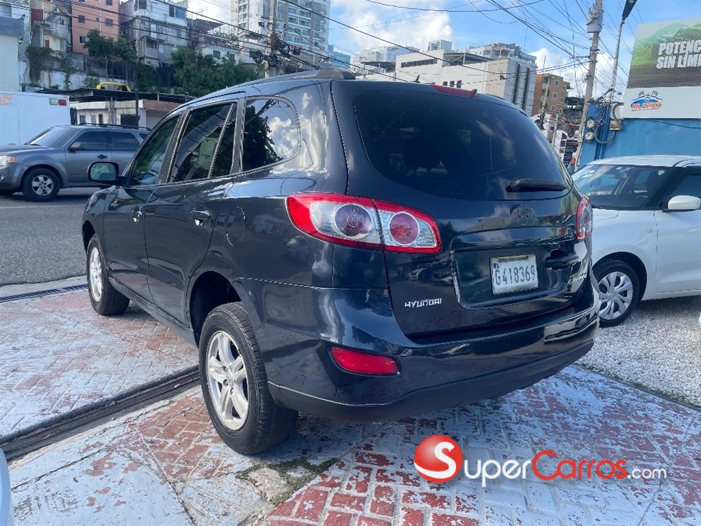 2011 Hyundai Grand Santa Fe — foto 6 / 9