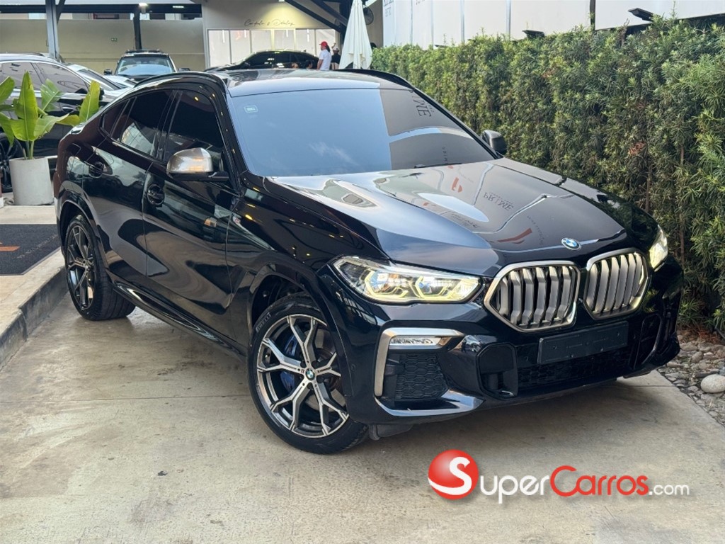 2020 BMW X 6 M50i — foto 2 / 10