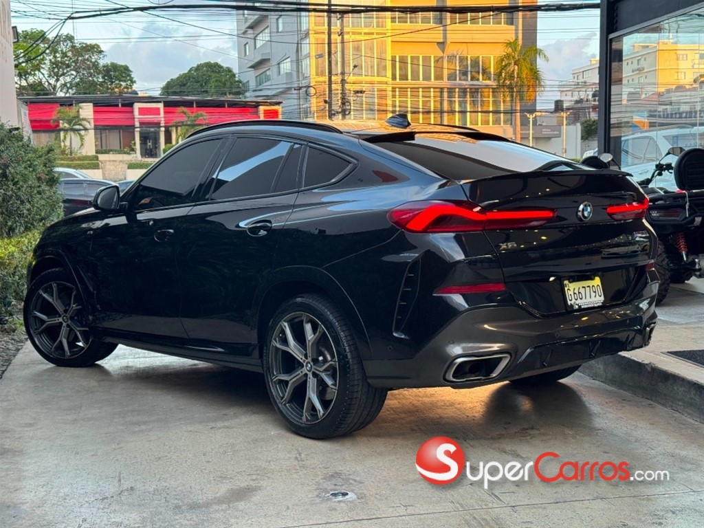 2020 BMW X 6 M50i — foto 3 / 10