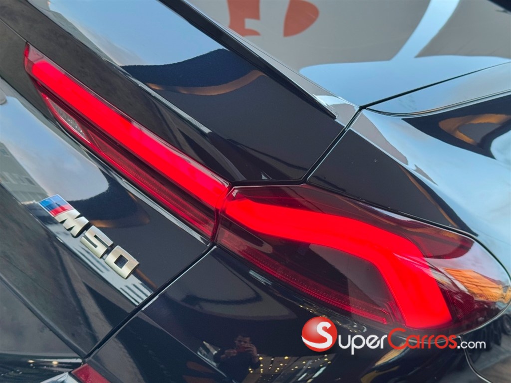 2020 BMW X 6 M50i — foto 4 / 10