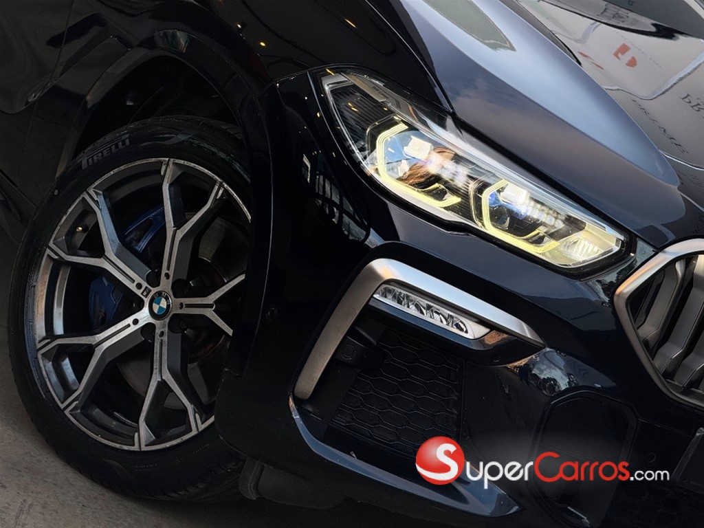 2020 BMW X 6 M50i — foto 5 / 10