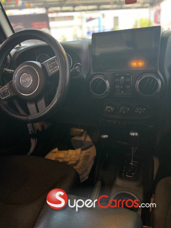 2016 Jeep Wrangler Unlimited Sport — foto 2 / 11