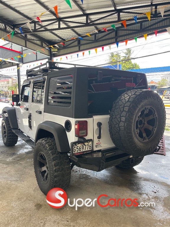 2016 Jeep Wrangler Unlimited Sport — foto 3 / 11