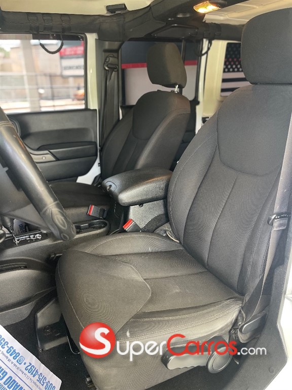 2016 Jeep Wrangler Unlimited Sport — foto 10 / 11