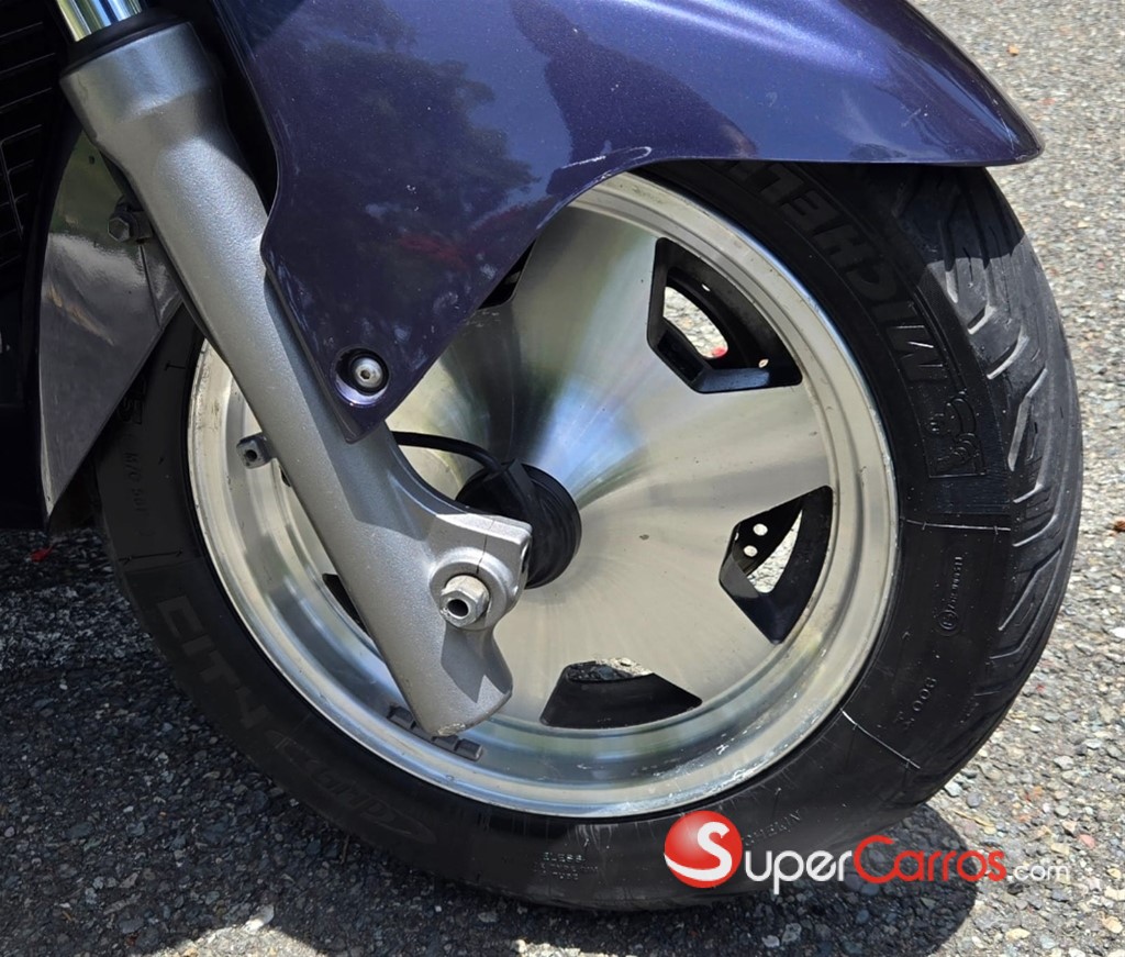 2000 Suzuki AN 125 — foto 10 / 11