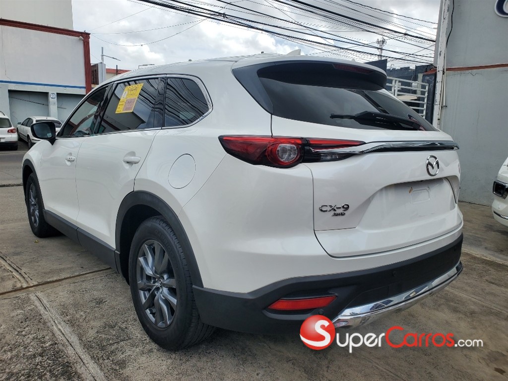 2021 Mazda CX-9 Exclusive — foto 8 / 12