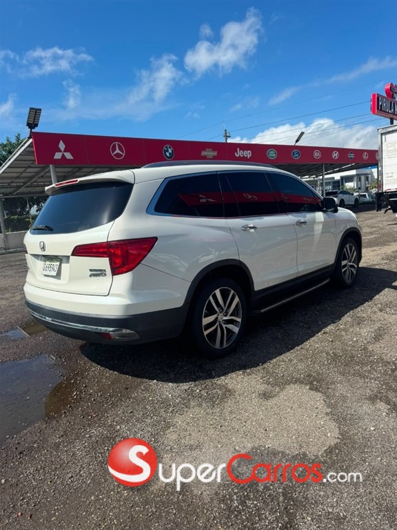 2016 Honda Pilot Touring — foto 4 / 9