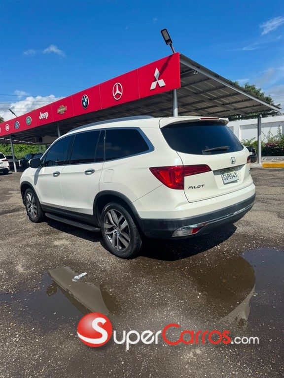 2016 Honda Pilot Touring — foto 5 / 9