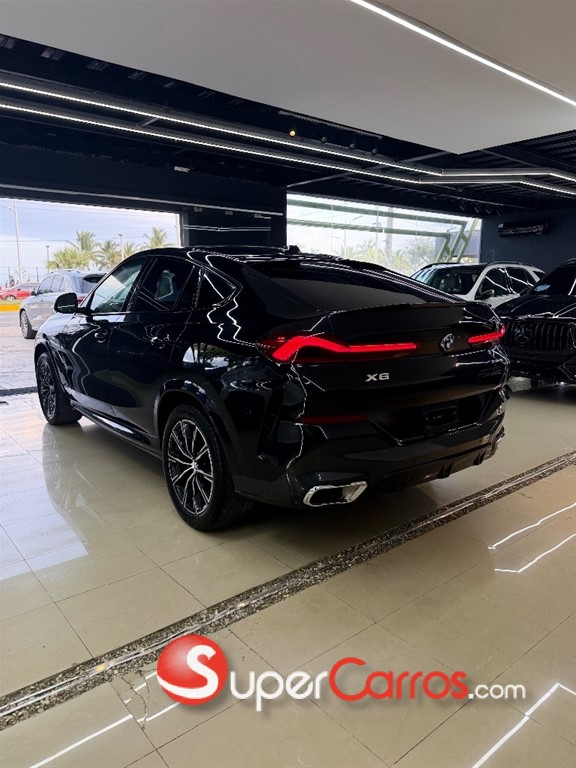 2025 BMW X 6 xDrive40i — foto 4 / 12