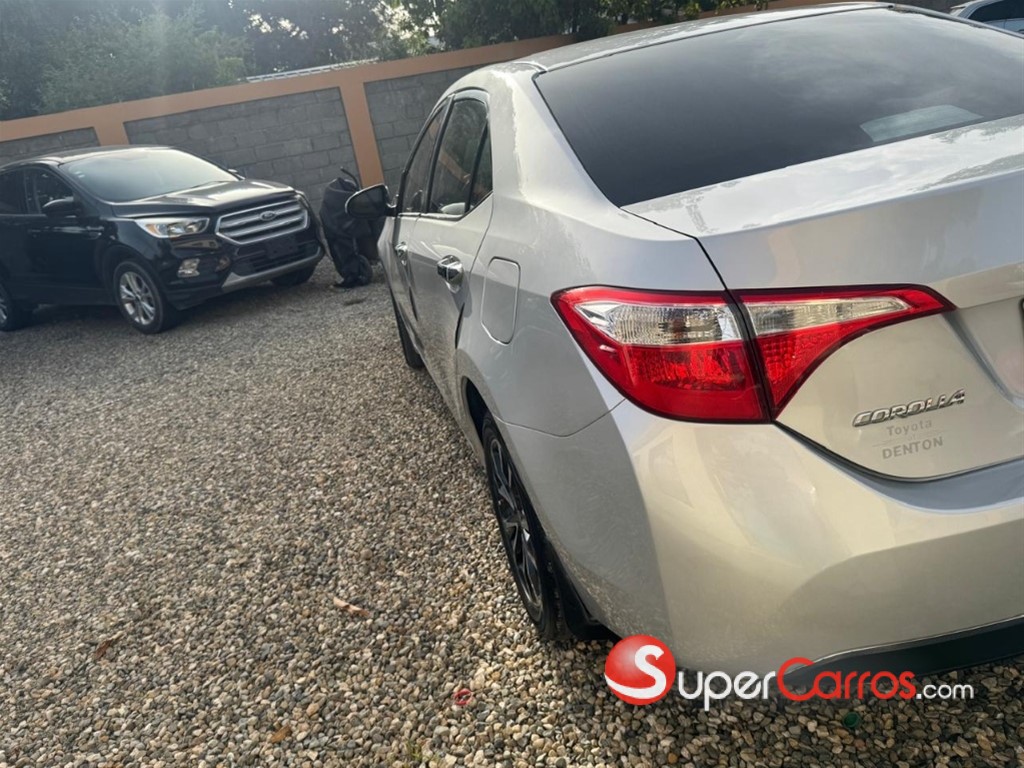 2016 Toyota Corolla LE — foto 6 / 8