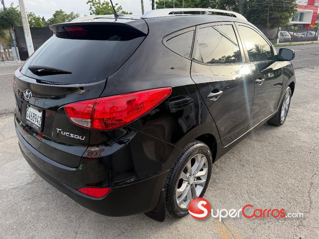 2013 Hyundai Tucson — foto 6 / 11