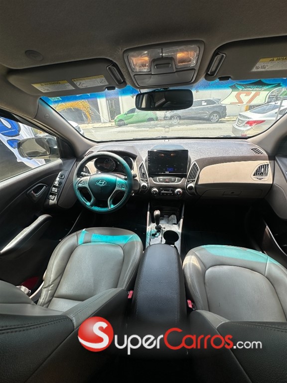 2012 Hyundai Tucson — foto 11 / 12