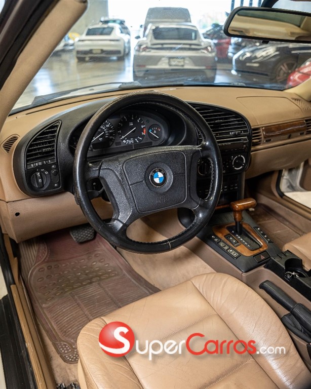 1995 BMW Serie 3 325i — foto 10 / 11