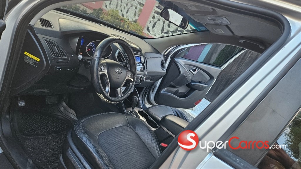 2011 Hyundai Tucson — foto 11 / 12