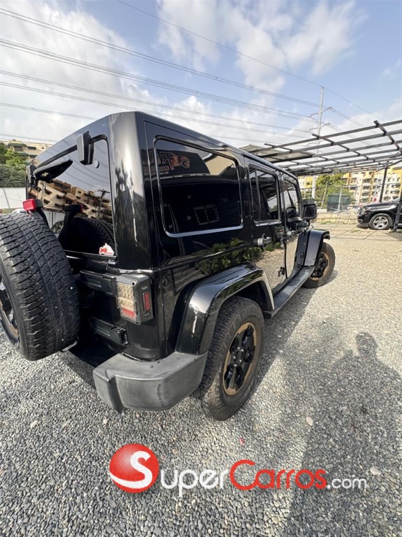 2014 Jeep Wrangler Sahara Unlimited — foto 4 / 11