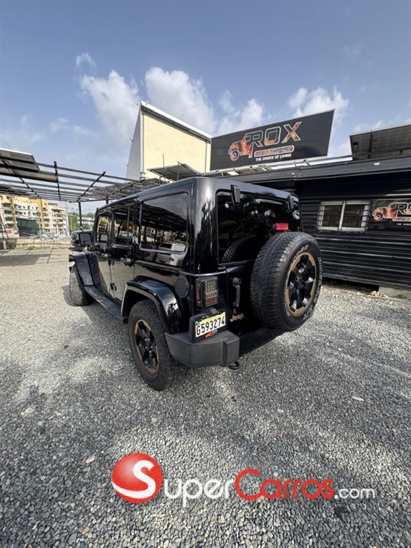 2014 Jeep Wrangler Sahara Unlimited — foto 11 / 11