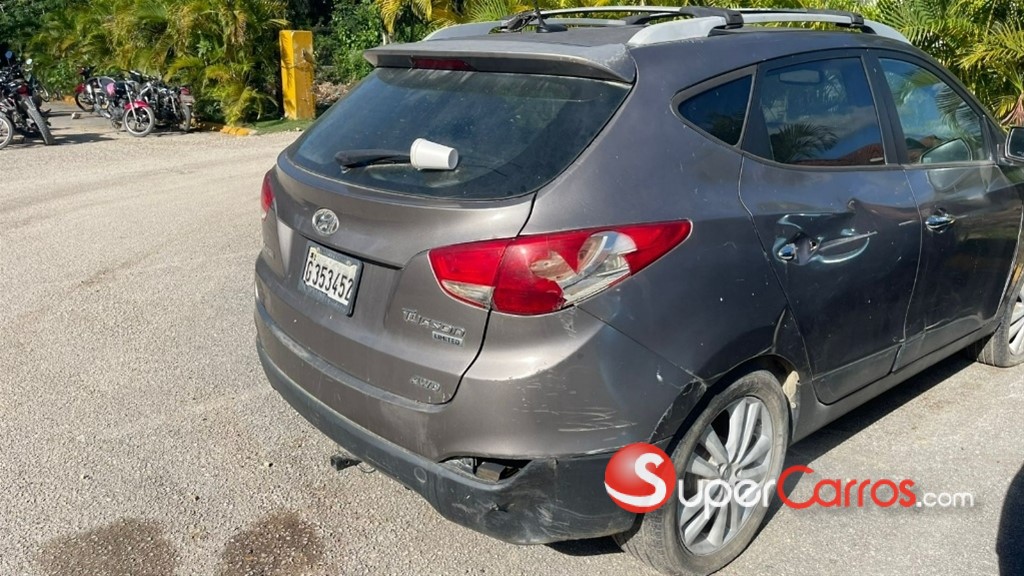 2013 Hyundai Tucson — foto 11 / 12