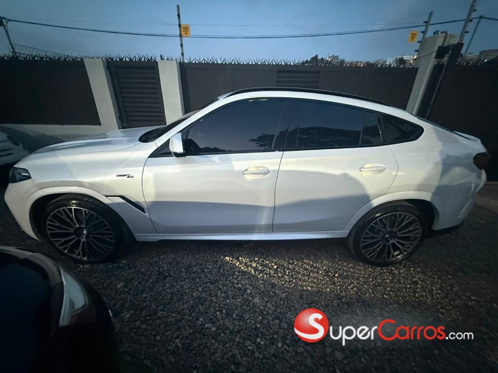 2024 BMW X 6 xDrive40i — foto 6 / 12