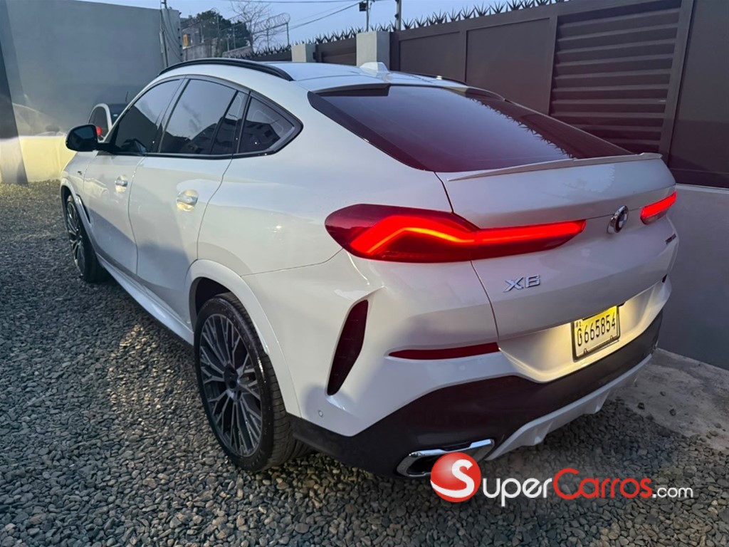 2024 BMW X 6 xDrive40i — foto 7 / 12