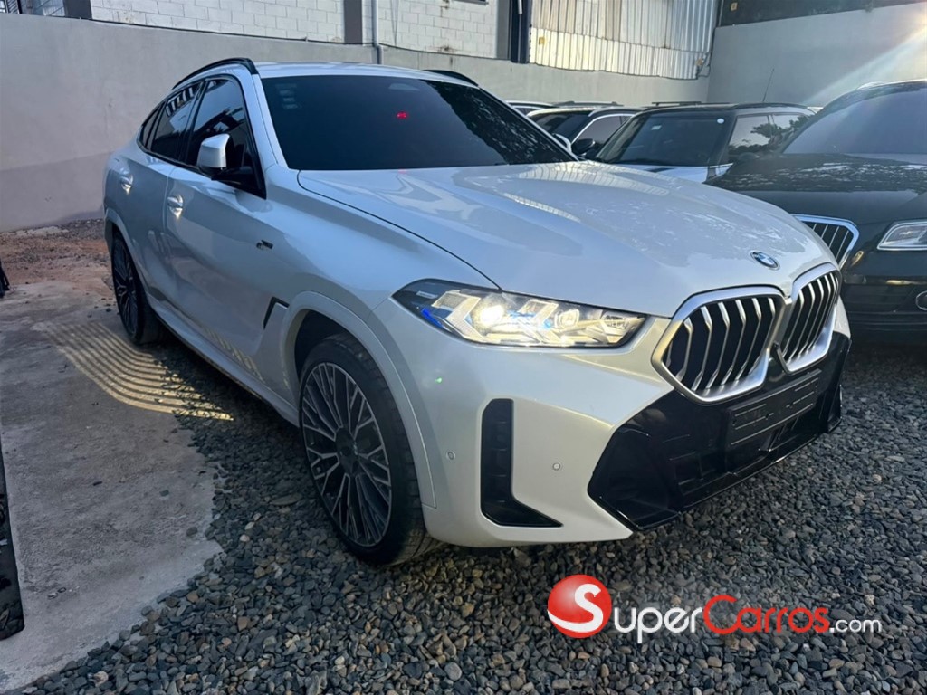 2024 BMW X 6 xDrive40i — foto 9 / 12
