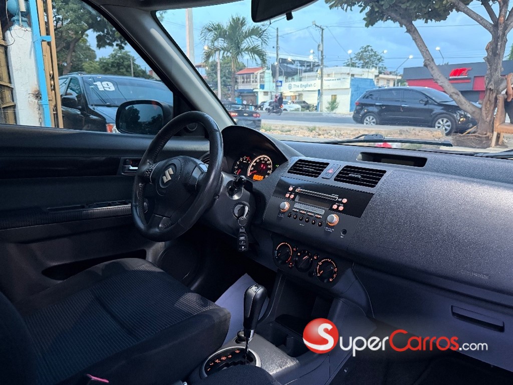 2010 Suzuki Swift — foto 6 / 8