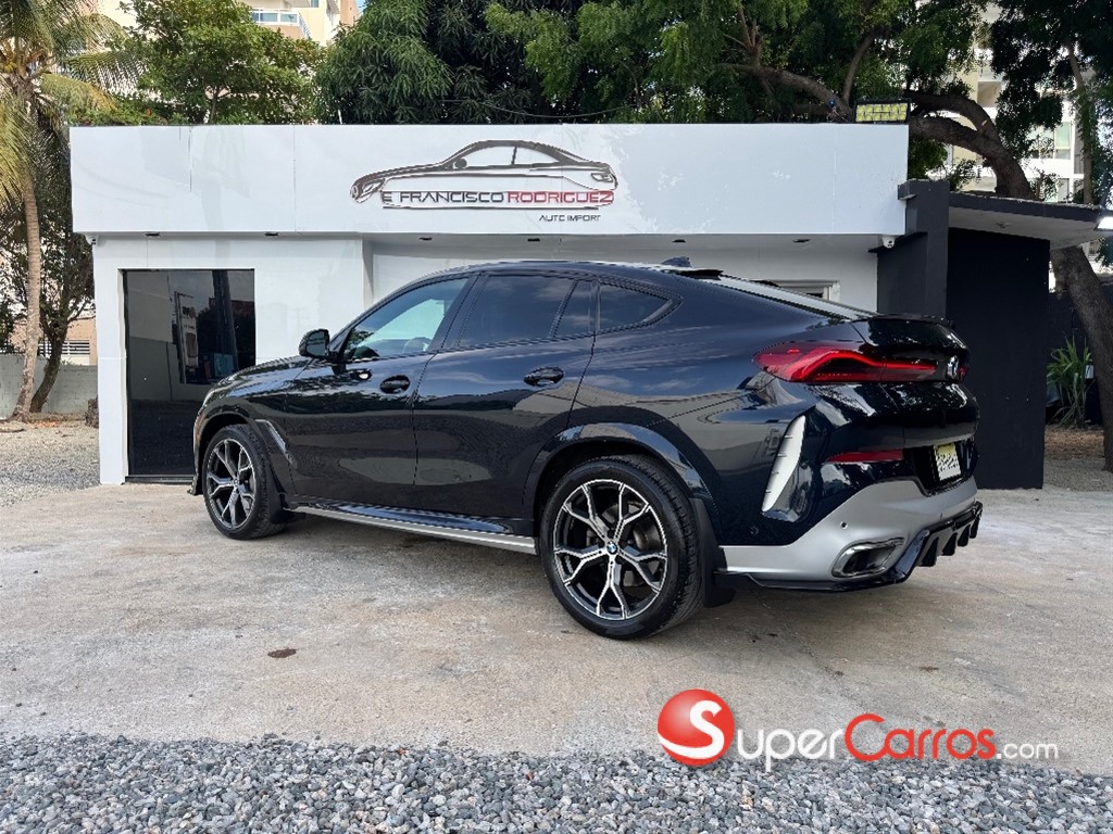 2021 BMW X 6 xDrive40i — foto 6 / 9