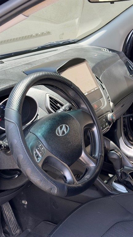 2015 Hyundai Tucson — foto 8 / 12